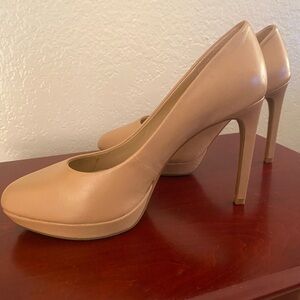 Light tan high heel pumps